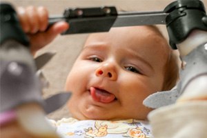 happy baby with tongue-tie 