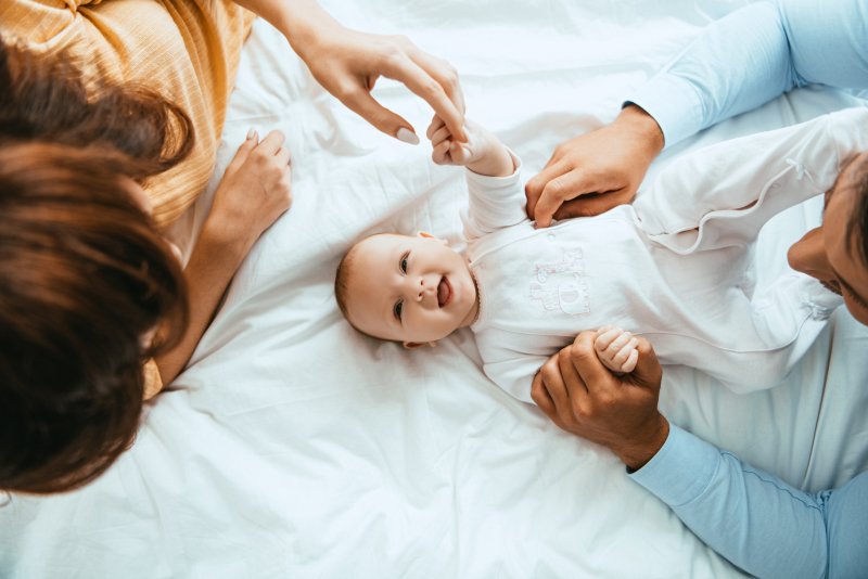 a baby with its parents