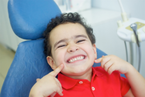 a young child visiting their dentist 