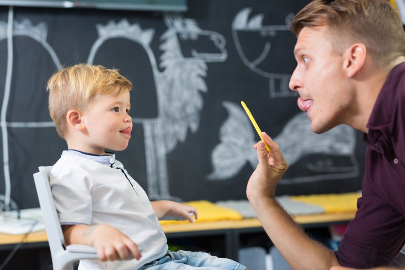 child receiving speech therapy